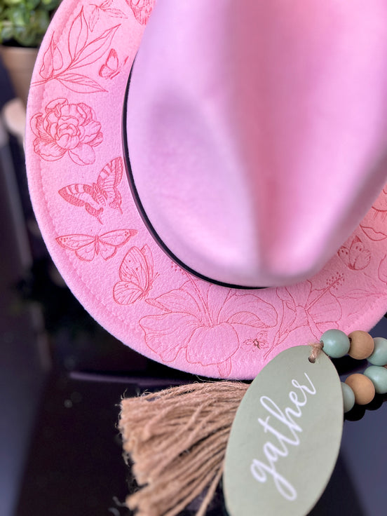 Engraved wide-brim fedora with belt buckle and custom band