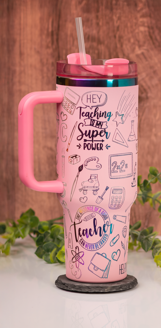 Closeup of “Teaching is my Superpower” engraved on pink tumbler