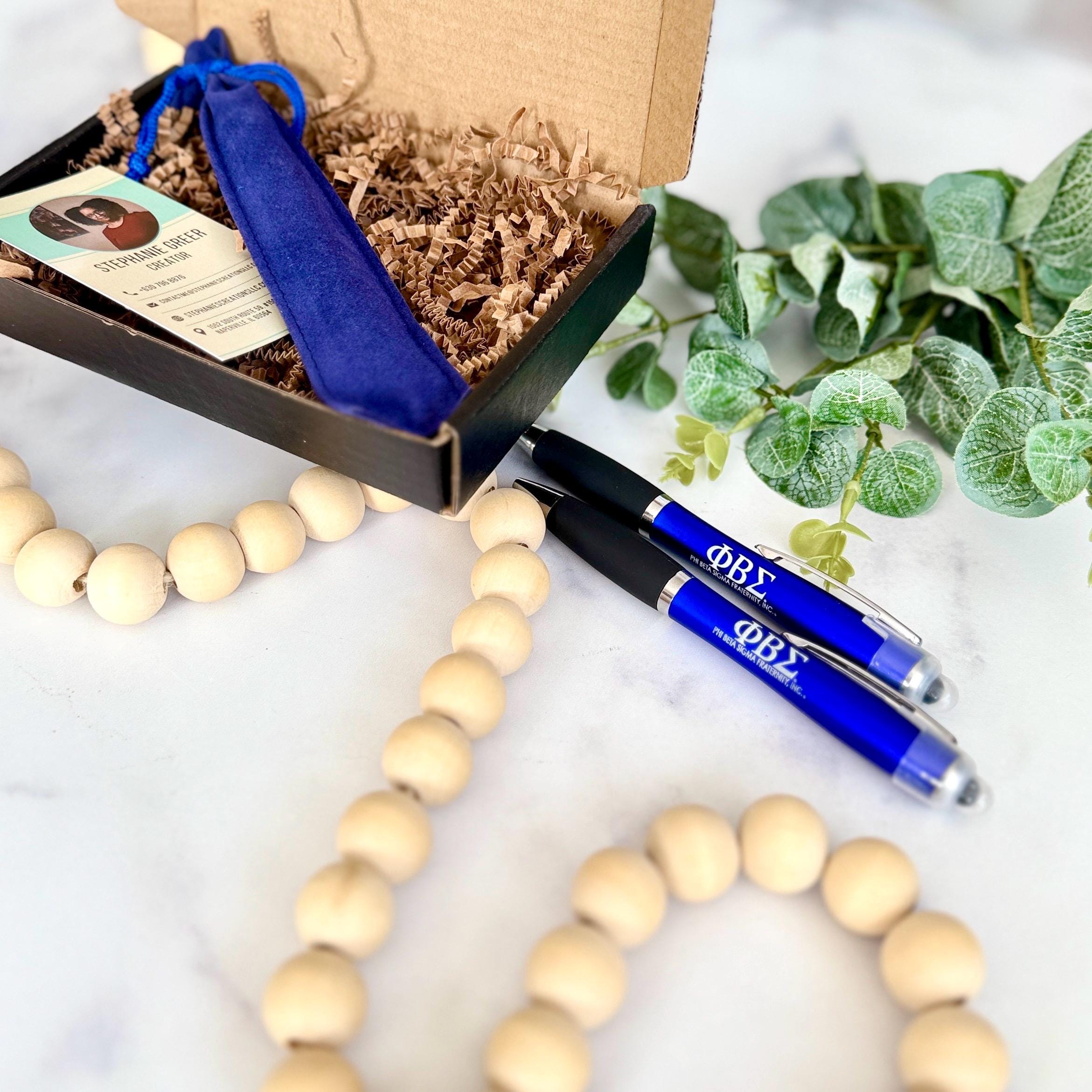 Blue engraved pen for Phi Beta Sigma with metallic accents and soft-touch black grip