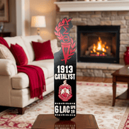 Delta Sigma Theta display paddle with DST crest and torch on cozy end table