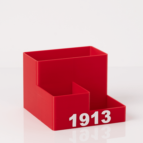 DST 1913 crimson red 3D printed desk organizer with raised lettering on white background