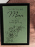Overhead view of green Notes to My Mom engraved journal with rose artwork and the phrase the things I never got to say.
