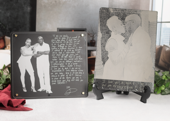 Detailed view of handwriting engraved on slate plaque