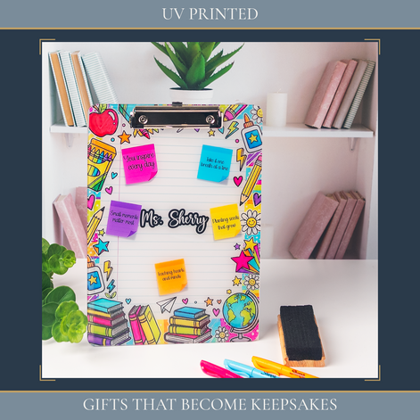 Personalized UV printed teacher clipboard with colorful classroom design and custom name, displayed on a white desk as a teacher appreciation gift