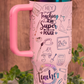 Closeup of “Teaching is my Superpower” engraved on pink tumbler